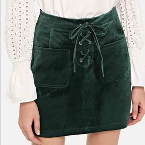 Green suede skirt